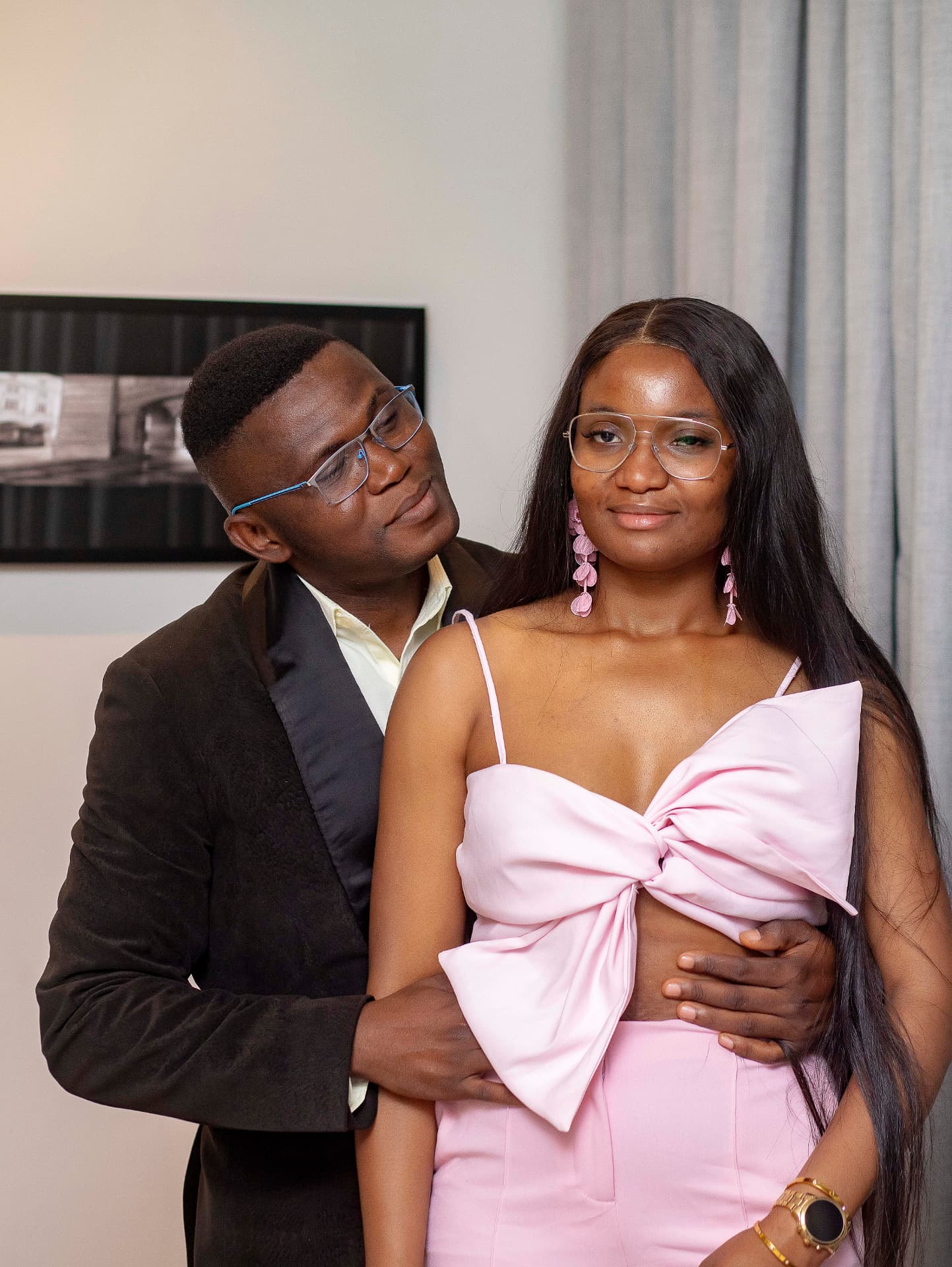 Tessy and Rayz together, dressed in soft pink